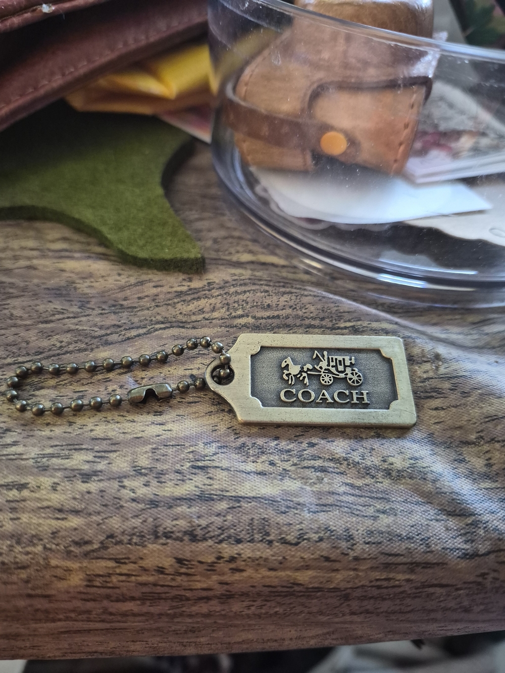 COACH Men's Brass Dog Tag Keychain in Antique Gold